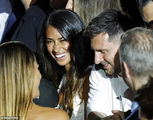 The Argentine beauty dazzled as she smiled alongside her World Cup-winning husband