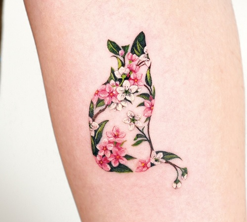 Cat and flowers tattoo