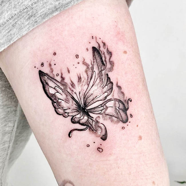 Fire butterfly arm tattoo by @corrupt_file