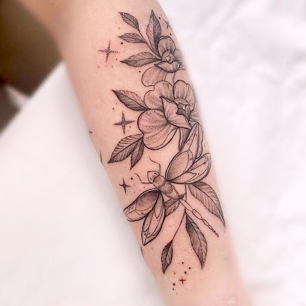 Floral dragonfly forearm tattoo by @abievetattoo