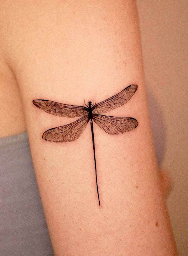 Realism dragonfly tattoo by @seotattoos