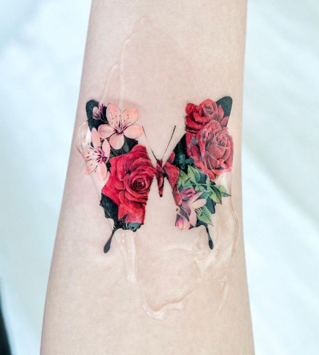Rosy butterfly tattoo by @tattooist_color.b