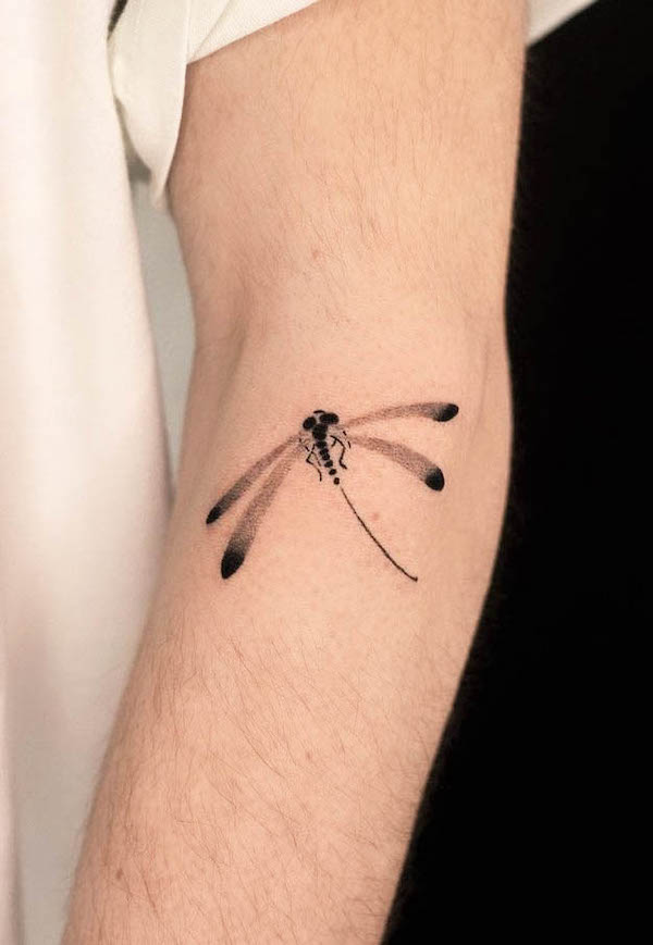 Simple gradiant dragonfly tattoo by @dahan.orient