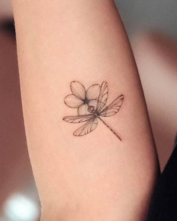 Small dragonfly flower tattoo by @bunami.ink
