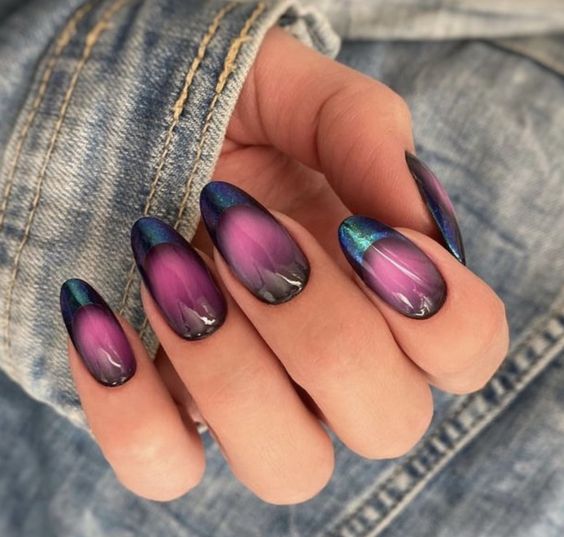 Purple nail color with galaxy-themed black French tips on long round nails