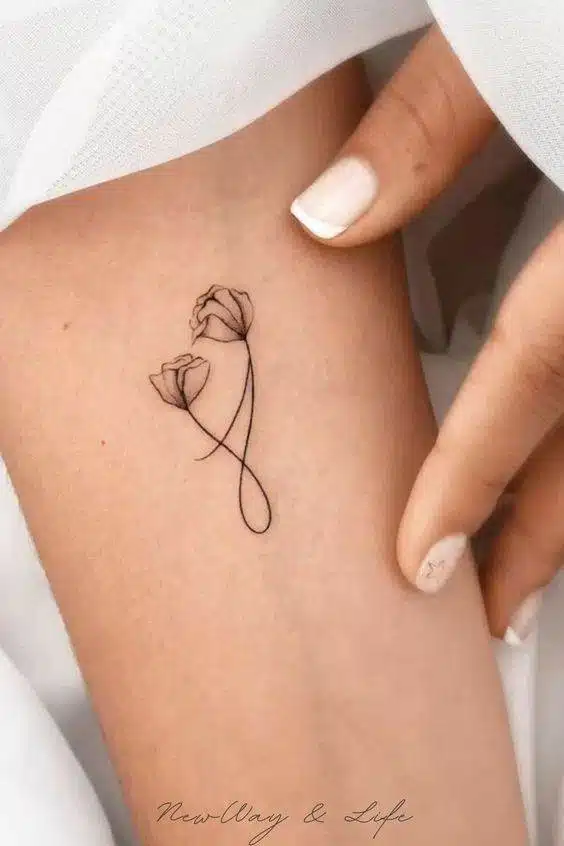 25 Simple Yet Elegant Tiny Tattoos For Women - 193