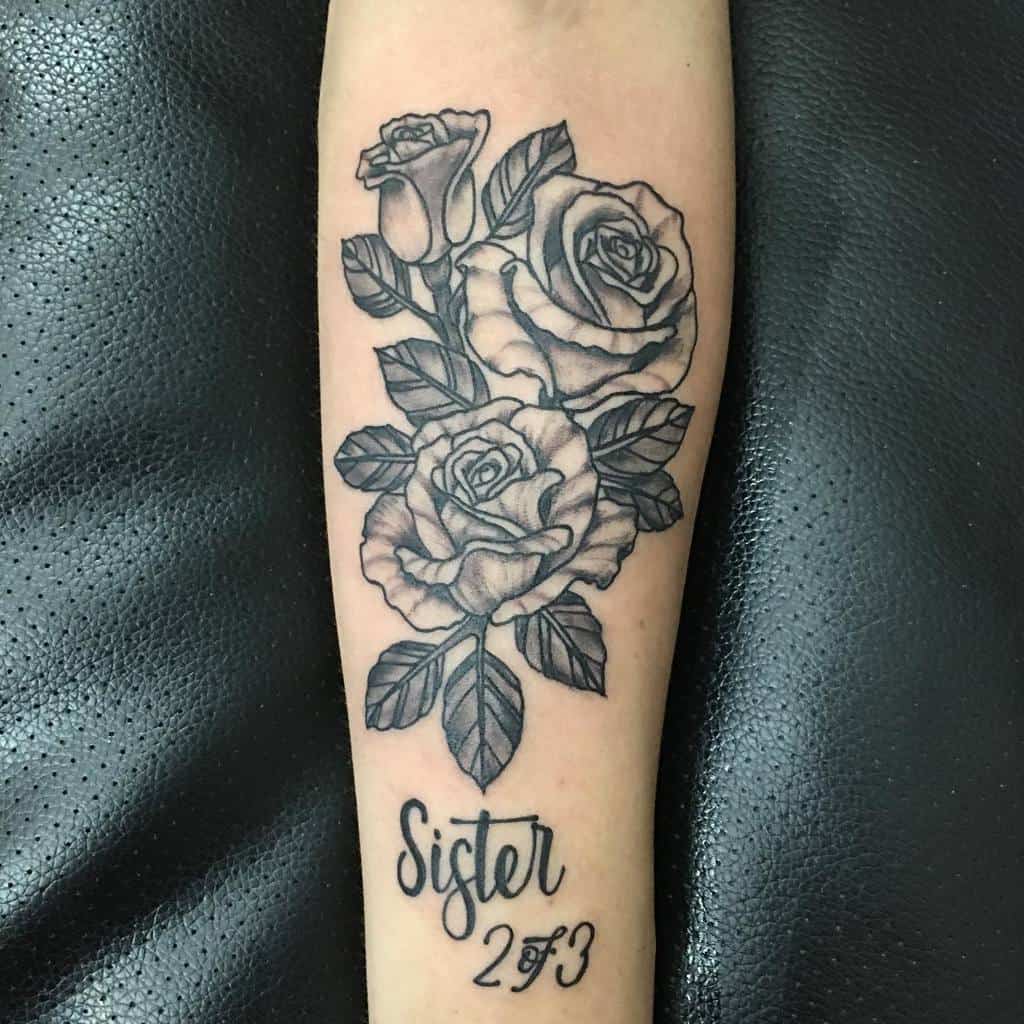 brazo-flor-negro-y-sombra-hermana-tatuaje-real_ink_for_life