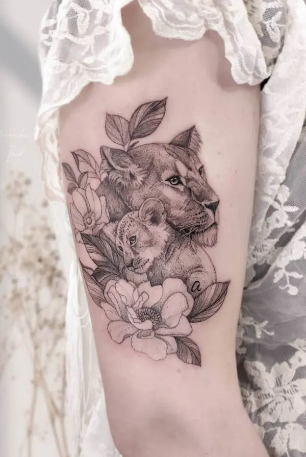Mother and baby lion tattoo by @marika_ink