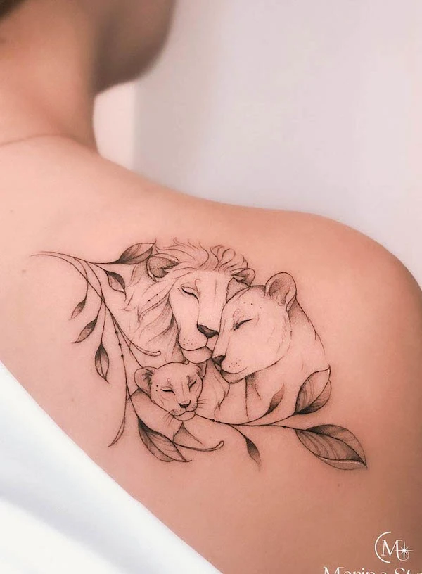 A loving family lion tattoo by @marytattooer