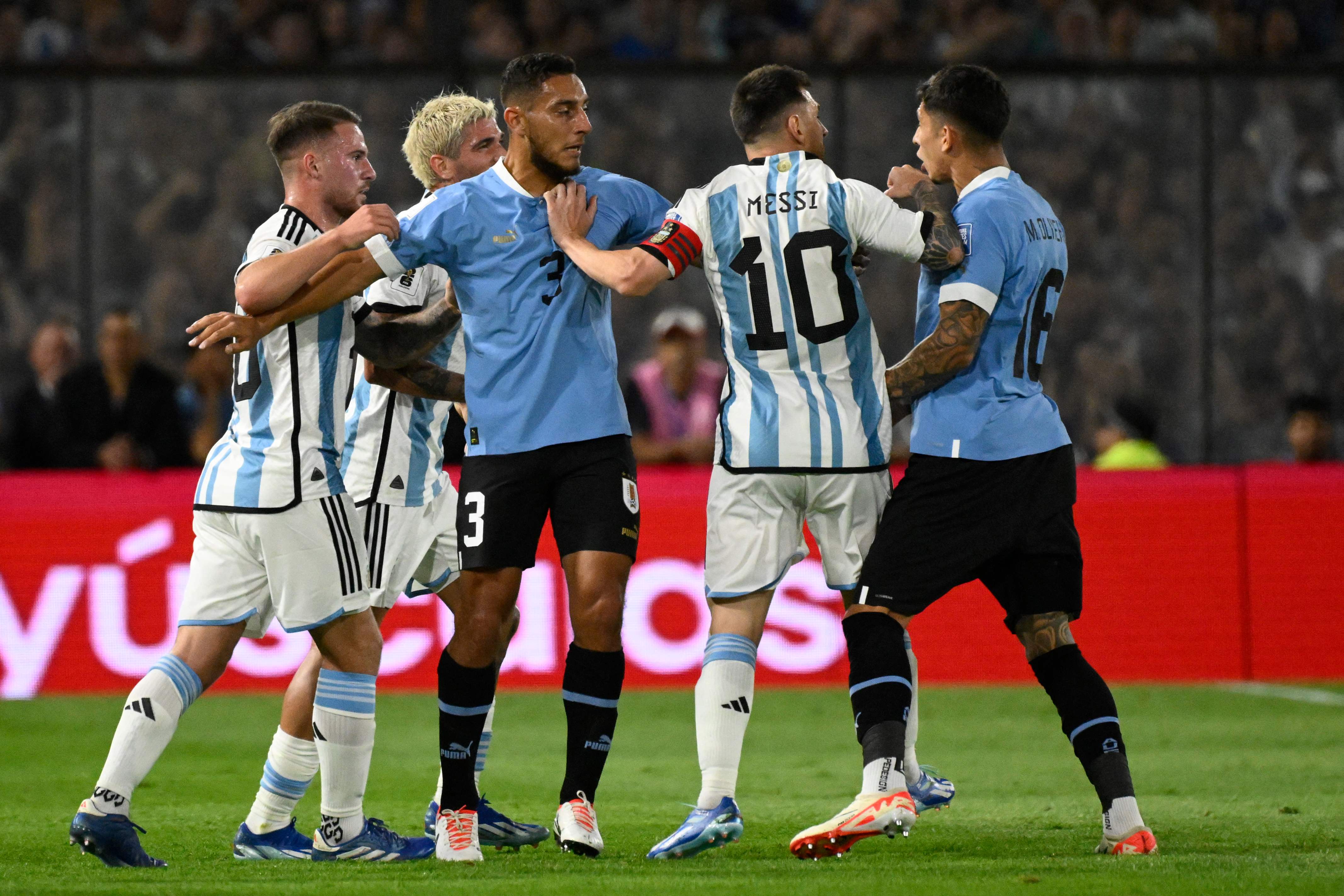 Shocking moment Lionel Messi sparks huge brawl after grabbing rival by neck  but is NOT sent-off in Argentina defeat | The Sun