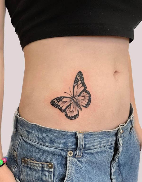 Butterfly waist tattoo by @delicecastattoo