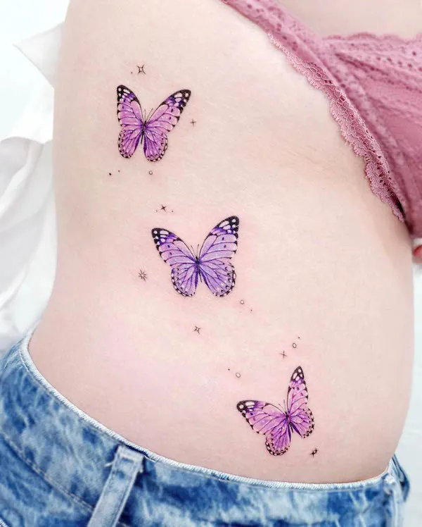 Pink and purple butterflies tattoo by @tattooist_solar
