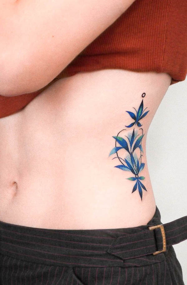 Leaf ornamental waist tattoo by @eden_tattoo_