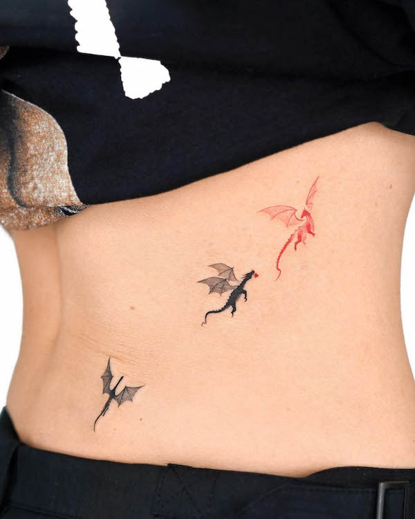 Small dragon waist tattoo by @choiyun_tattoo