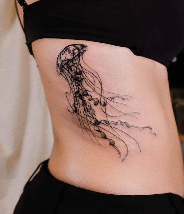 Jellyfish side waist tattoo by @imsumimi