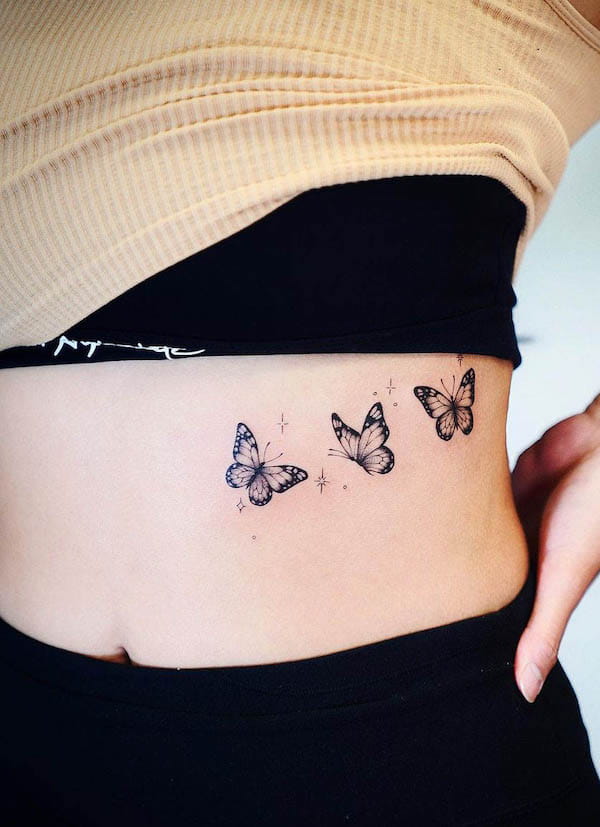 Butterfly waist tattoo by @baronarttattoo