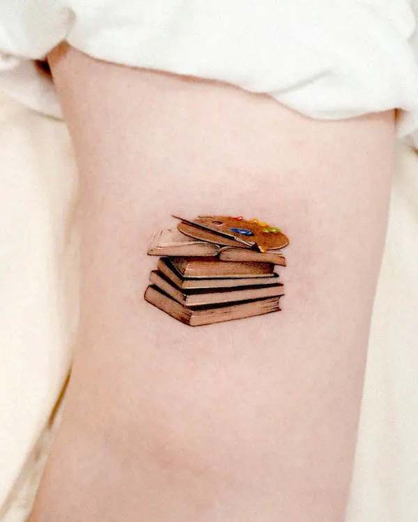 Books and paint by @hansantattoo