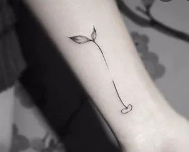 tiny sapling tattoo