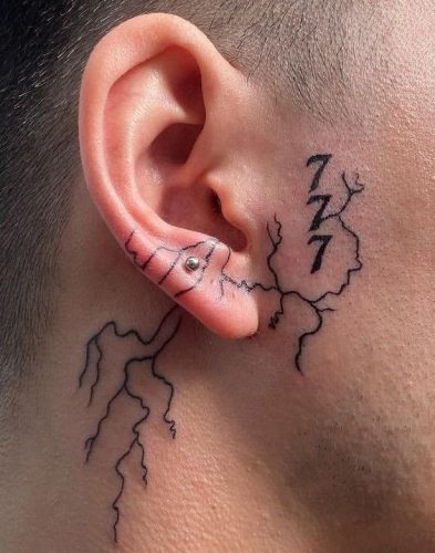 Unleash the Storm: 18 Striking Lightning Bolt Tattoo Designs for Electrifying Expression in 2024