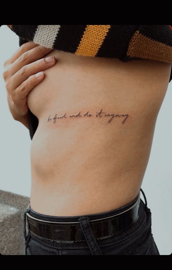 Quoted Rib Tattoo