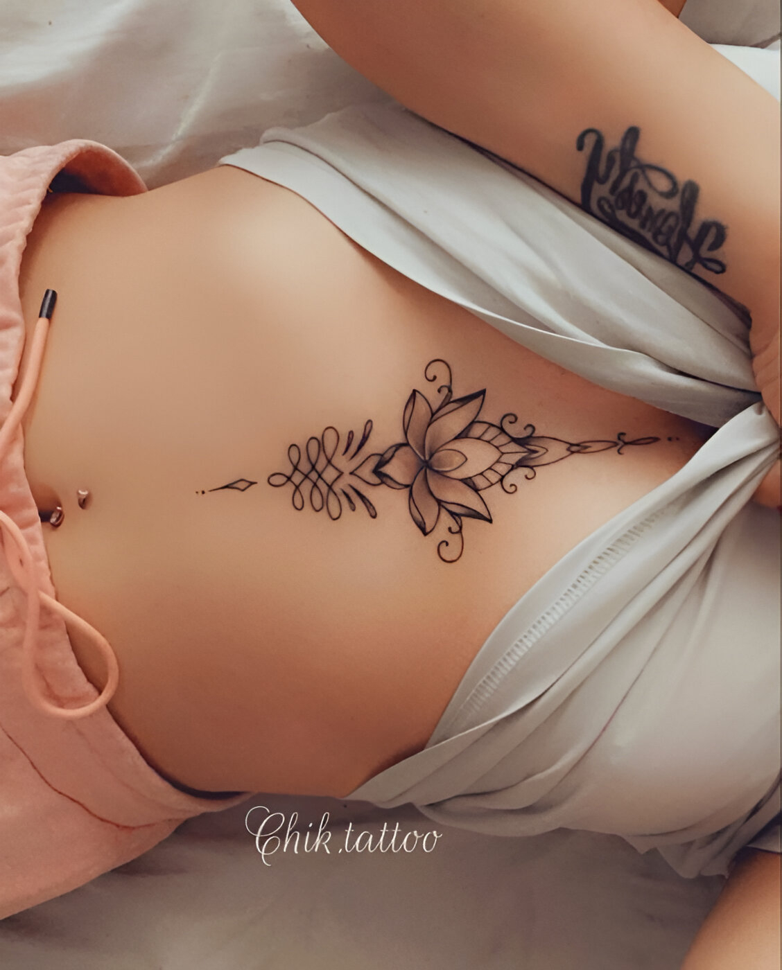 Vertical Underboob Tattoo