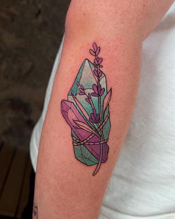 Crystal and lavender tattoo on forearm