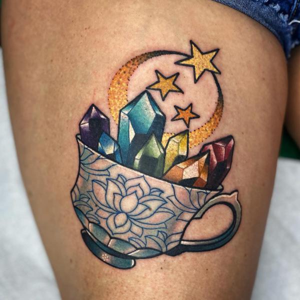 Crystal in bowl with crescent moon and stars tattoo