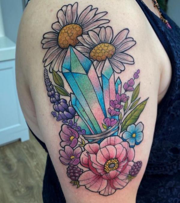 Crystal with flowers and daisy tattoo