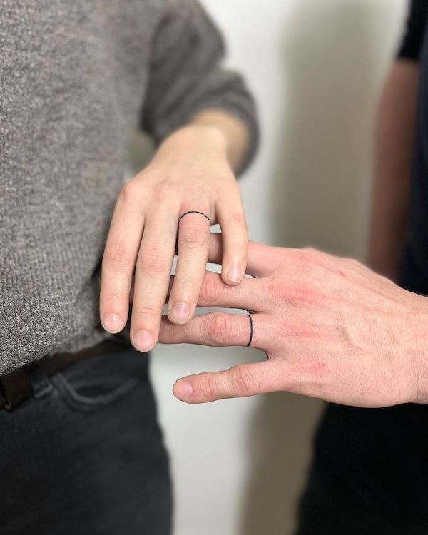 Minimalist wedding ring tattoos by @martinataufer