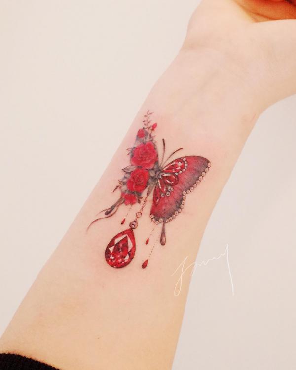 Red butterfly and roses with diamond tattoo