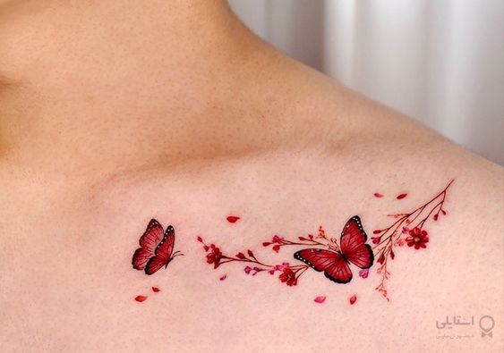 Red butterfly and wildflower clavicle tattoo