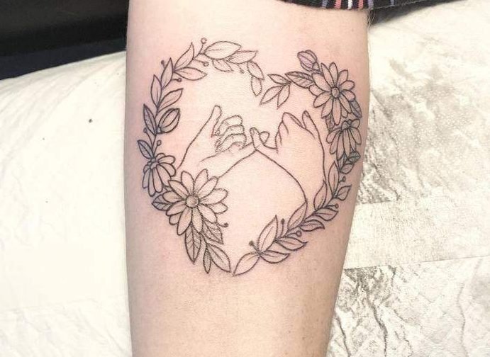 pinky promise tattoo with flowers