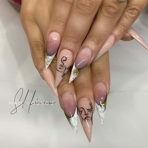 Artistic Stiletto Nails with White Tips